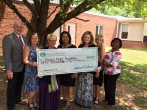 From left are: Jeff Smith, GCCF president; Mary Woodiwiss, GCCF projects and grants manager, Lisa Lane, Project Hope co-executive director; Mamie Nicholson, GCCF board member; Susan Sachs, Project Hope co-executive director; Martha Barnette, GCCF board member; and Amaryllis Turman, GCCF board member.